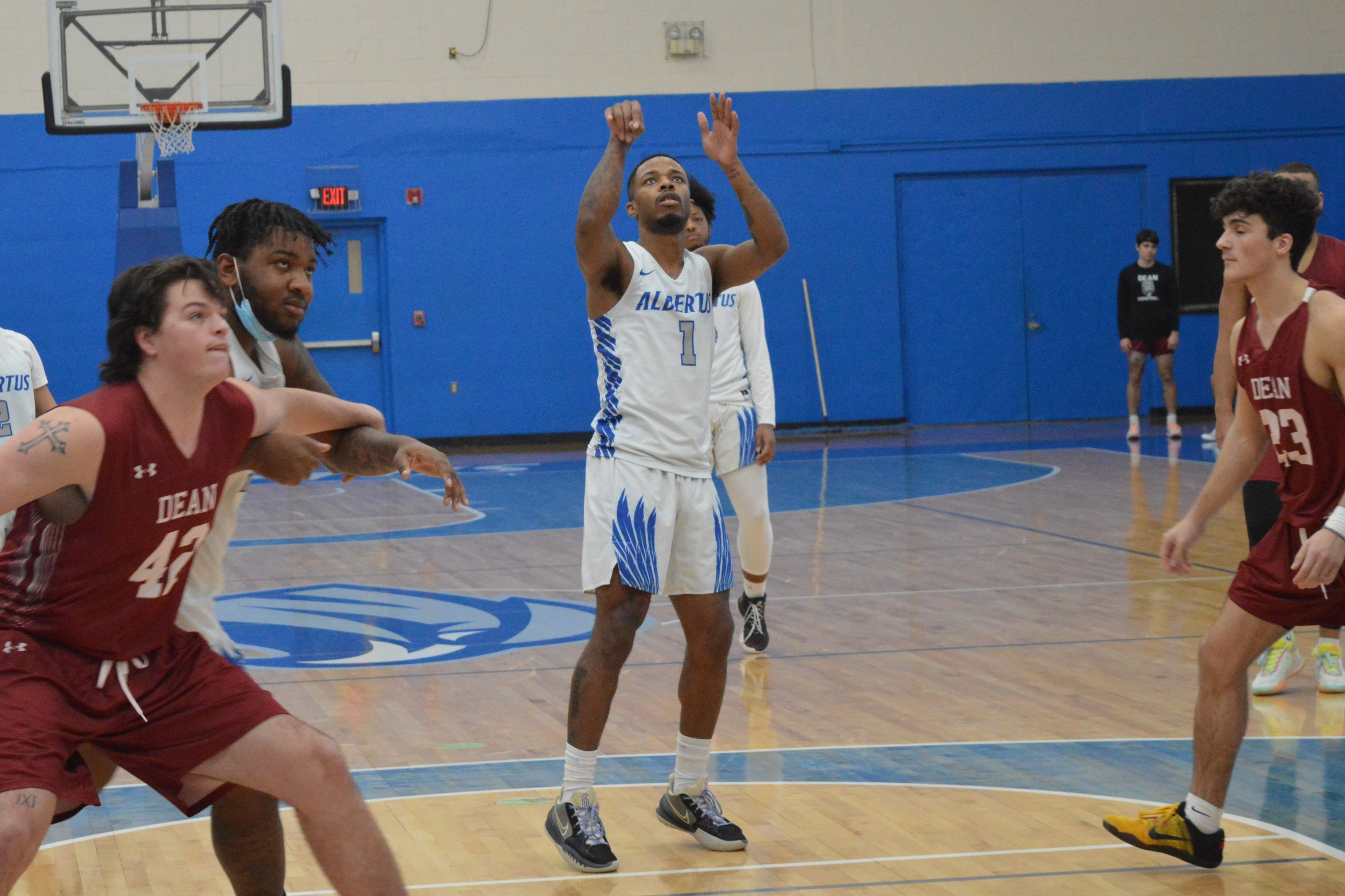 Men's Basketball Battles Back to Defeat GNAC Rival JWU in Overtime, 83-79